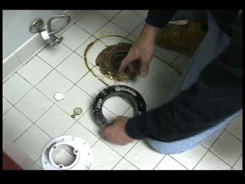 how to repair flange on a toilet