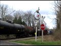 a wisconsin & southern freight train (jh) passes the wig wag in lima center, wi.