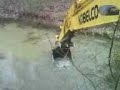 Aaron Crabtree running a trackhoe fixing a lakepart2