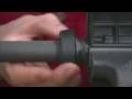Larry Potterfield, Founder and CEO of MidwayUSA, demonstrates the process for installing a free float handguard on an AR rifle. Free float handguard tubes allow the barrel to be isolated from pressure that is placed on the handguard, preventing a shift in point of impact when a sling or rest is used.