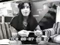 Nikki Sixx playing with condom