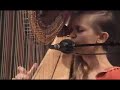 She sings too! As requested, I am giving a credit to Joanna Newsom for her fine performance.