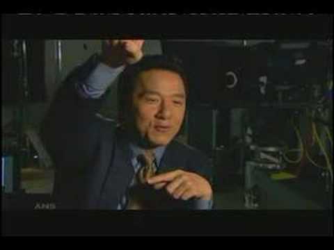 JACKIE CHAN CLIMBS EIFFEL TOWER