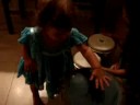 Sisters playing drums