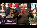 Girl faints behind Bill Clinton at a campaign event