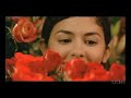 Audrey Tautou picking flowers in À la folie... pas du tout Audrey Tautou picking flowers in À la folie... pas du tout
