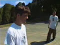 BAM KICKS FOOTBALLS AT CARS