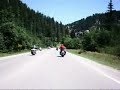 Deer Jumps Over Biker