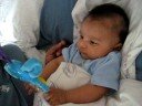 Mohsin touching his toy