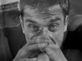 Bekijk muziek clip van Robbie Williams met Lola
