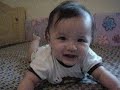 baby casual play on bed