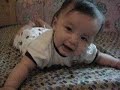 baby casual play on bed