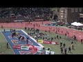 Penn's 4x100m Men's Team competes in the 2012 Penn Relays. The Penn team runs in lane 5.