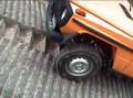 Mercedes G Gelandewagen going up a steep concrete hill