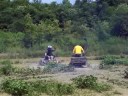 James and Larry playing in the mud