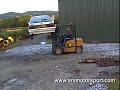 Car falls off fork lift