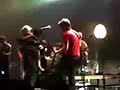 Alex Turner gets tackled some more and leaves the stage