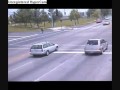 Car crashes into another car at an intersection, sending sec
