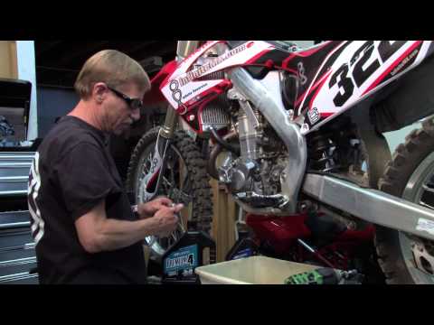 Crf450 - http://www.dirtillustrated.com Teddy Boyko show you how to make you Honda CRF450 engine last 25% longer. He shows you the difference between the High end bil...