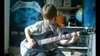 Eight year old plays metallica - one