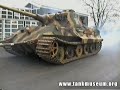 Towing the Tank Museums King Tiger back into the museum after a brief stay in the workshop area.Tiger 104 is the UK's only Henschel-turreted King Tiger. It was recovered from Aux Marais near Beauvais, France by British Royal Engineers in January 1945 after it was abandoned by it's crew following suspension damage and ultimately a broken drive-shaft. The tow vehicle in this clip is a Chieftain Armoured Recovery Vehicle.