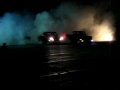 Wicked tire popping two truck burn out at Atkins Cruise night.