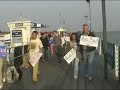 Ron Paul and supporters march to the Grand Hotel Mackinac Is