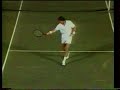 Connors throwing racquet in the air and winning the point Connors throwing racquet in the air and winning the point