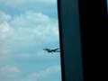 A Ted Airlines Airbus lands at Dulles Intl Airport