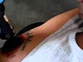 Air Grinder Tattoo Removal - air, grinder, painful, redneck, removal, tattoo, wtf, funny