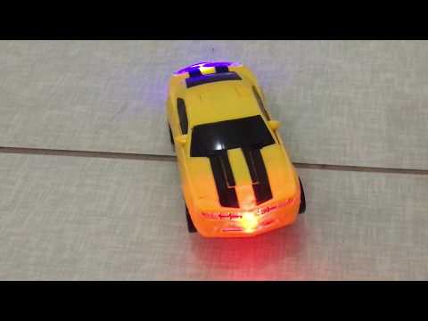 CARRO QUE VIRA ROBÔ CAMARO AMARELO PEQUENO KI D+ TOY'S BRINQUEDOS VIRA ROBÔ COM SOM E LUZES A PILHA