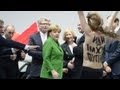 FEMEN give Putin and Merkel an eyeful in Hanover ...