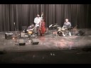with chris lightcap on bass and ted poor on drums. this concert took place at the dor� theatre on the campus of csu bakersfield in 2006. the audio/video technician was james dethlefson.