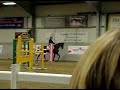 Oli Townend picking up a beer over a jump!