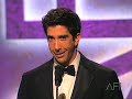 david schwimmer salutes harrison ford at the 28th afi life achievement award: a tribute to harrison ford (2000). afi facebook app: http://apps.facebook.com/a...