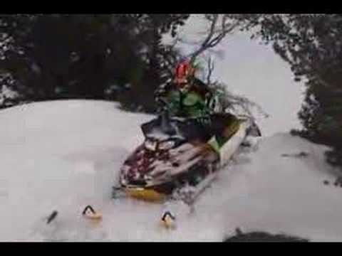 Hilarious snowmobile crash.