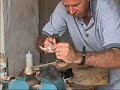 Bradbury making a cricket bat