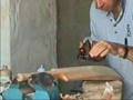 Bradbury making a cricket bat