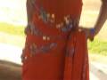 videos de Rust Faux Georgette Saree with Blouse