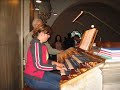 magdalena rainko plays organ recital in christ the king metropolitan cathedral in city of katowice, poland.
