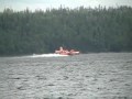 Waterbomber taking water at Gander Lake in Glenwood Newfoundland