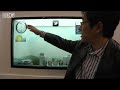CHIBA, JAPAN -- Samsung Electronics has developed see-through flat-panel screens intended to be used as high-tech windows. Used in an office they could overlay news or the time on top of the view outdoors or place them in a shop window and special offers can be flashed to shoppers while still allowing them to see inside.