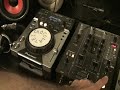 Pioneer DJs with the DJM-400 mixer and CDJ-400\ Pioneer DJs with the DJM-400 mixer and CDJ-400\