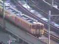 Desel cars run through a station