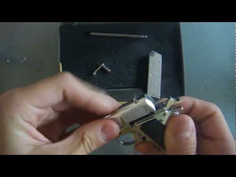 M1911.1 - A miniature 1:2 size non-firing Colt 1911. Very detailed. Can be cocked back, magazine can be removed, hammer can go down,trigger can be pulled, and can be d...