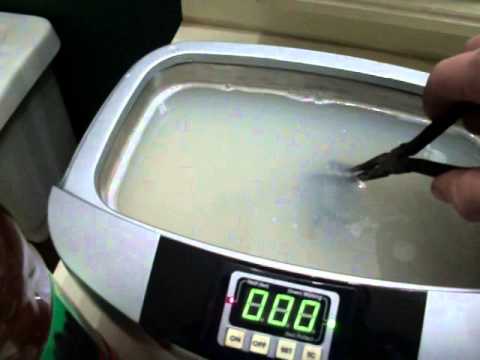 how to clean an outboard carburetor