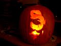 a awesome detailed pumpkin carve using a stencil of michael myers from halloween the movie