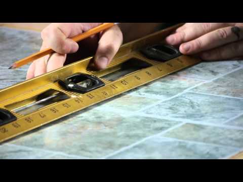 how to remove glue from self adhesive tiles