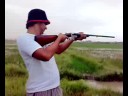 ahme firing with short gun.