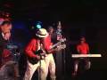 chu chu and the lovely band on stage at the cellar in long beach, california: chu chu, guitar; glen doll, harmonica; buddy 